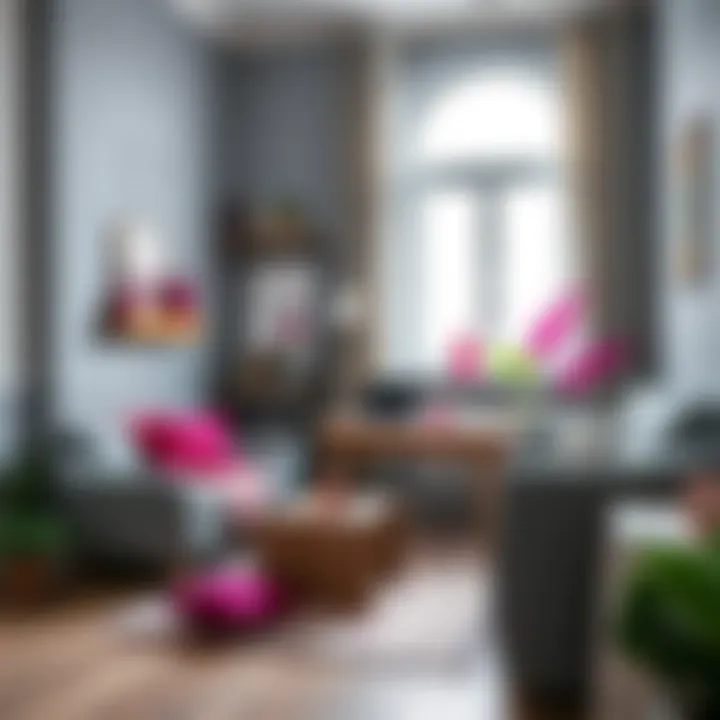 A stylish workspace combining grey furniture with fuchsia decorative elements.