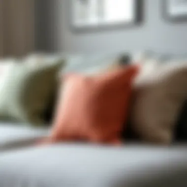 Elegant arrangement of cushions on a gray couch