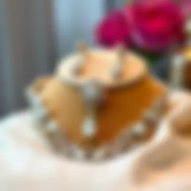 An elegant silver jewelry piece displayed on a soft fabric