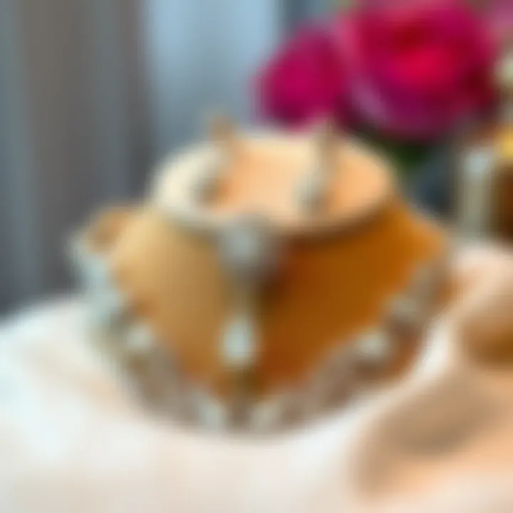 An elegant silver jewelry piece displayed on a soft fabric