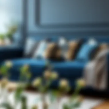 Stylish dark blue gray sofa with decorative cushions