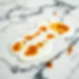 Close-up of a marble surface with tea stains