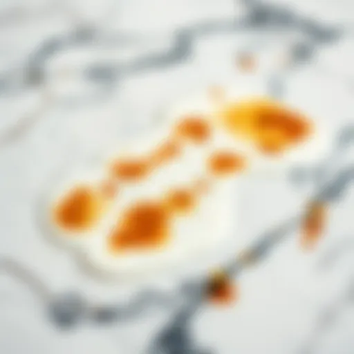 Close-up of a marble surface with tea stains